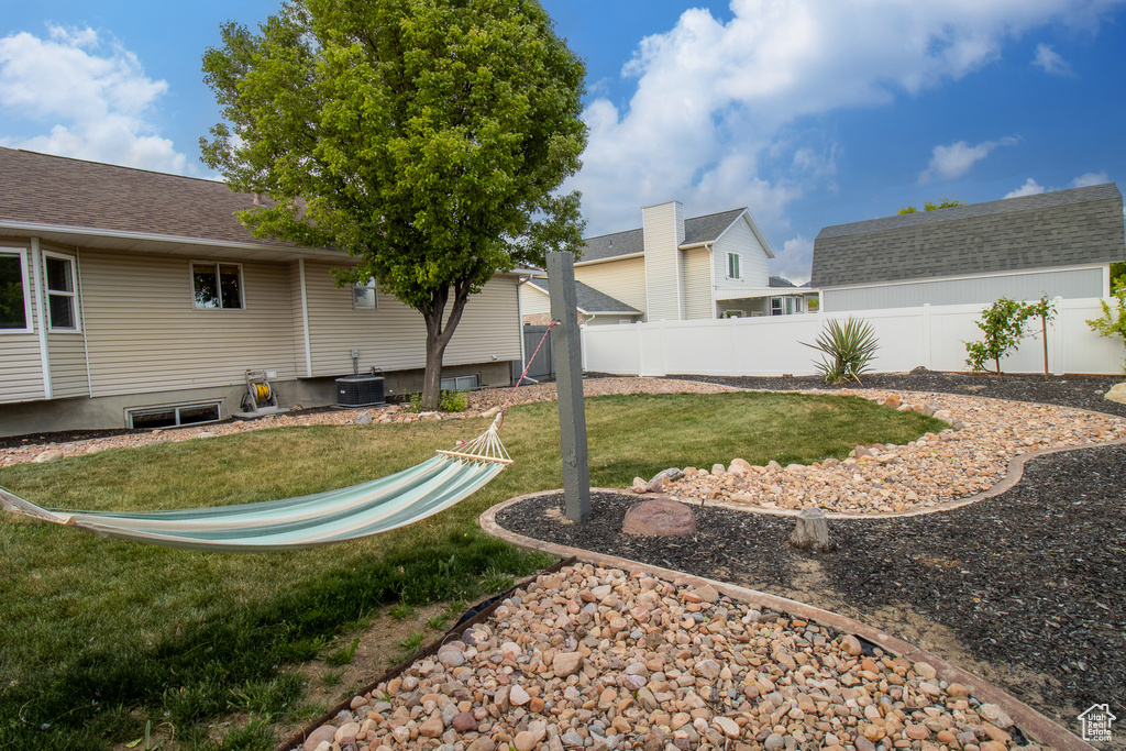 View of yard featuring central AC unit