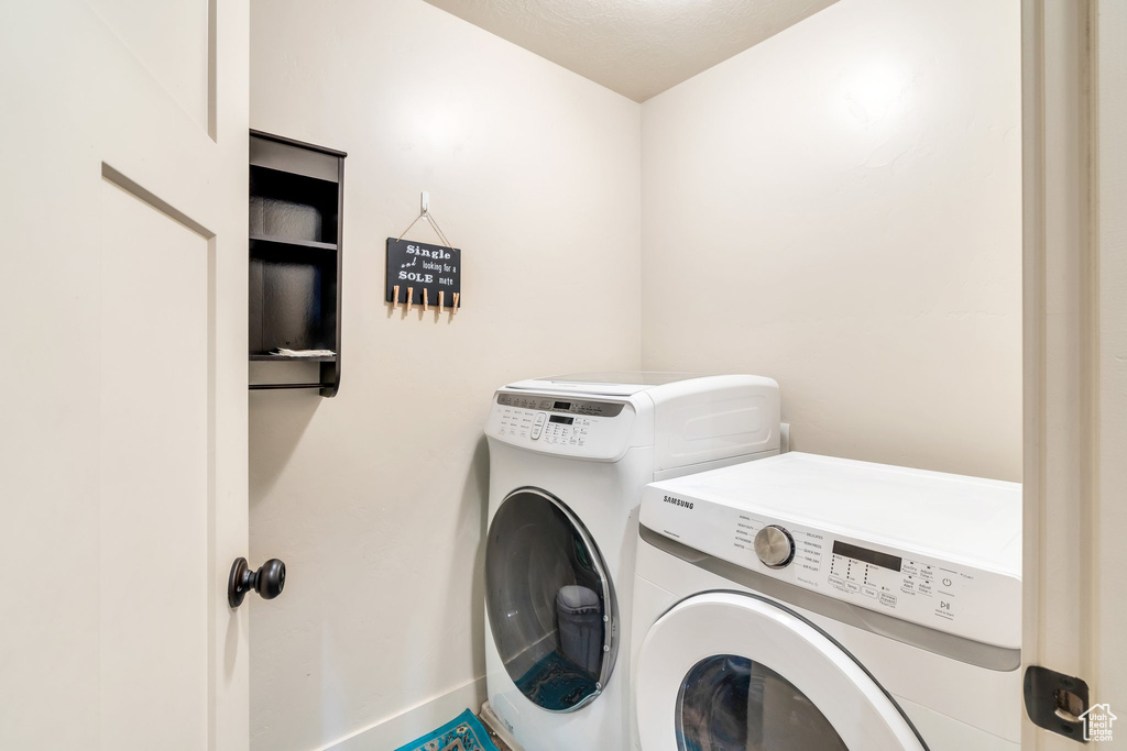 Laundry room with separate washer and dryer