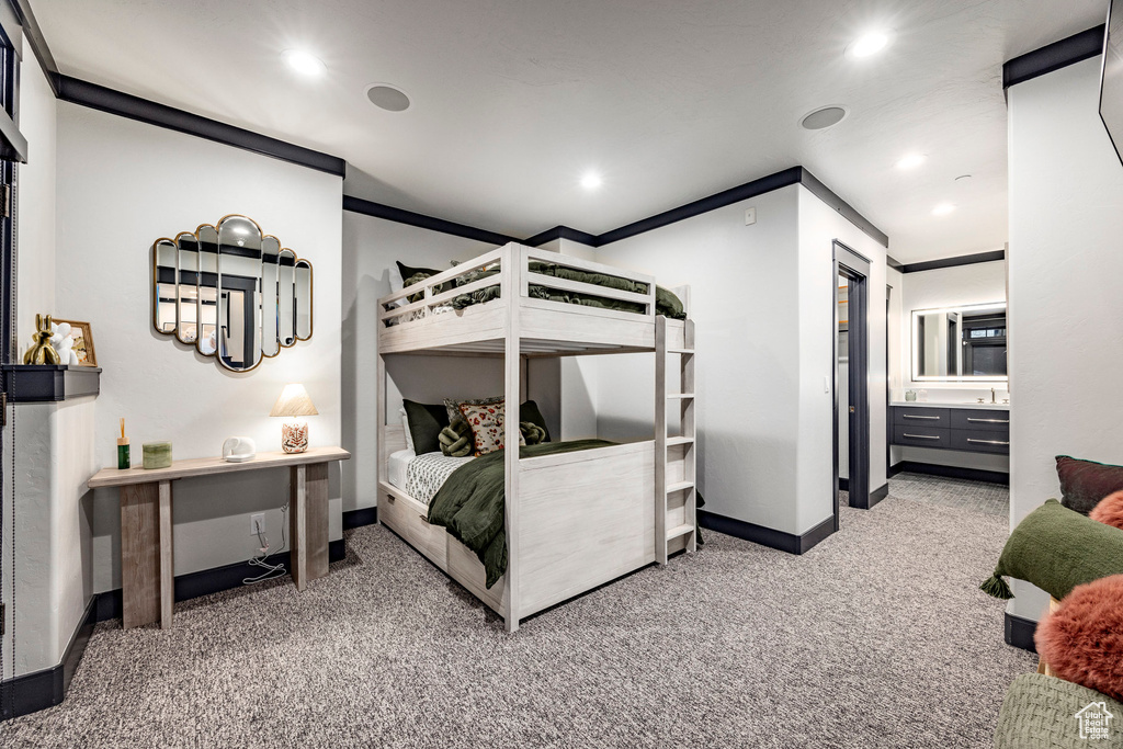 Bedroom featuring carpet floors, baseboards, and recessed lighting