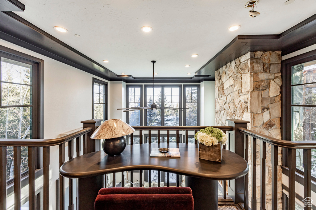 Dining space featuring recessed lighting and ornamental molding