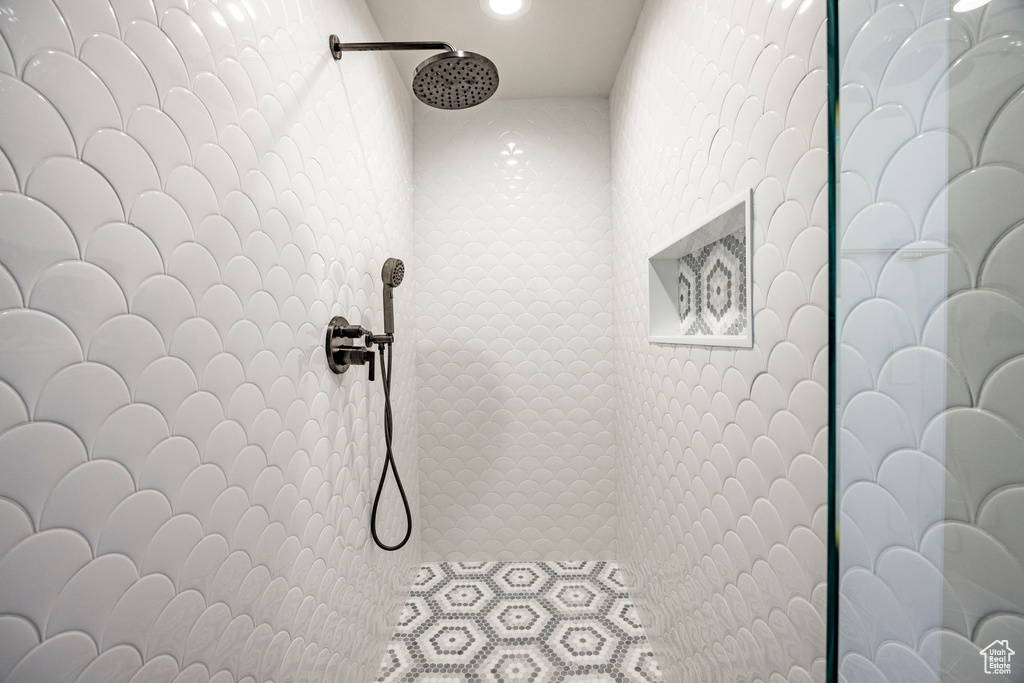 Bathroom view of a tile shower