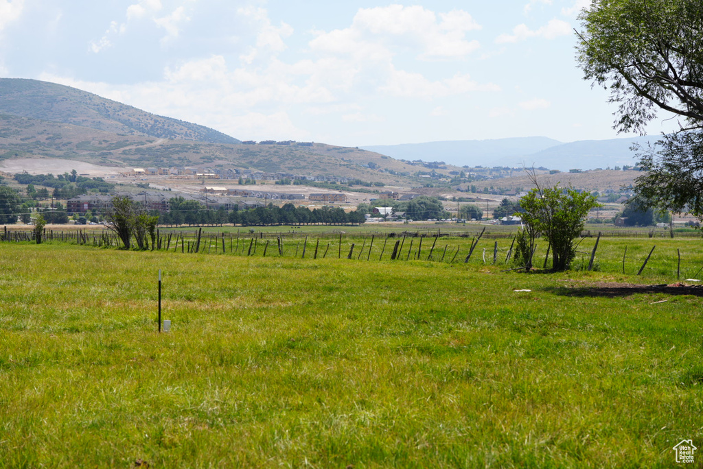 Property view of mountains featuring a rural view
