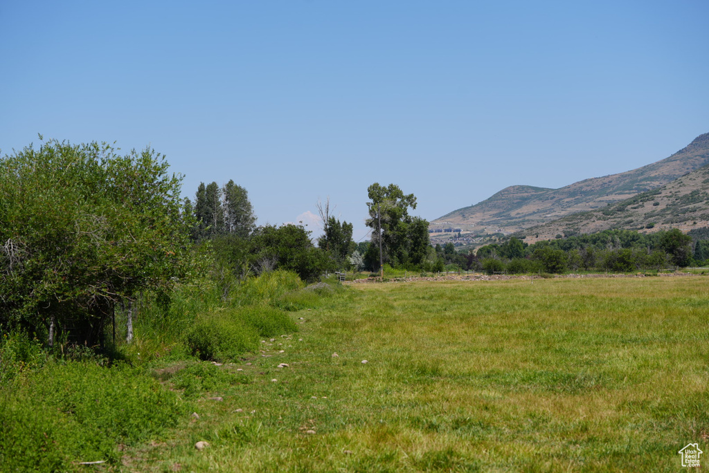 View of mountain feature with a rural view