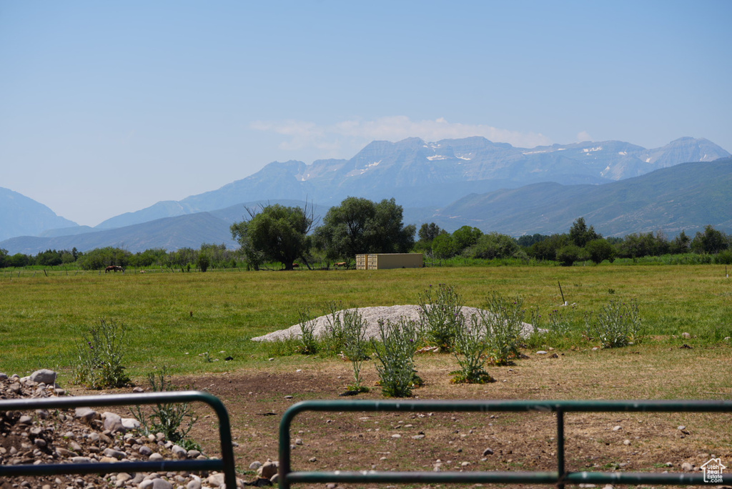 Property view of mountains with a rural view