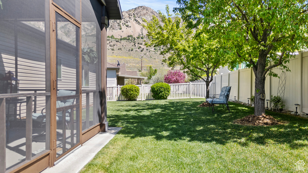 View of yard with a mountain view