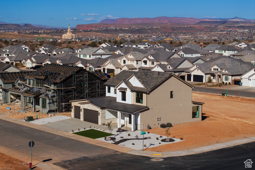 Aerial view featuring a mountain view