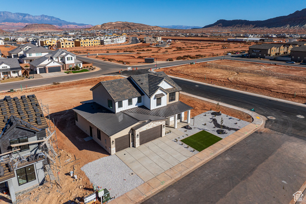 Birds eye view of property featuring a mountain view