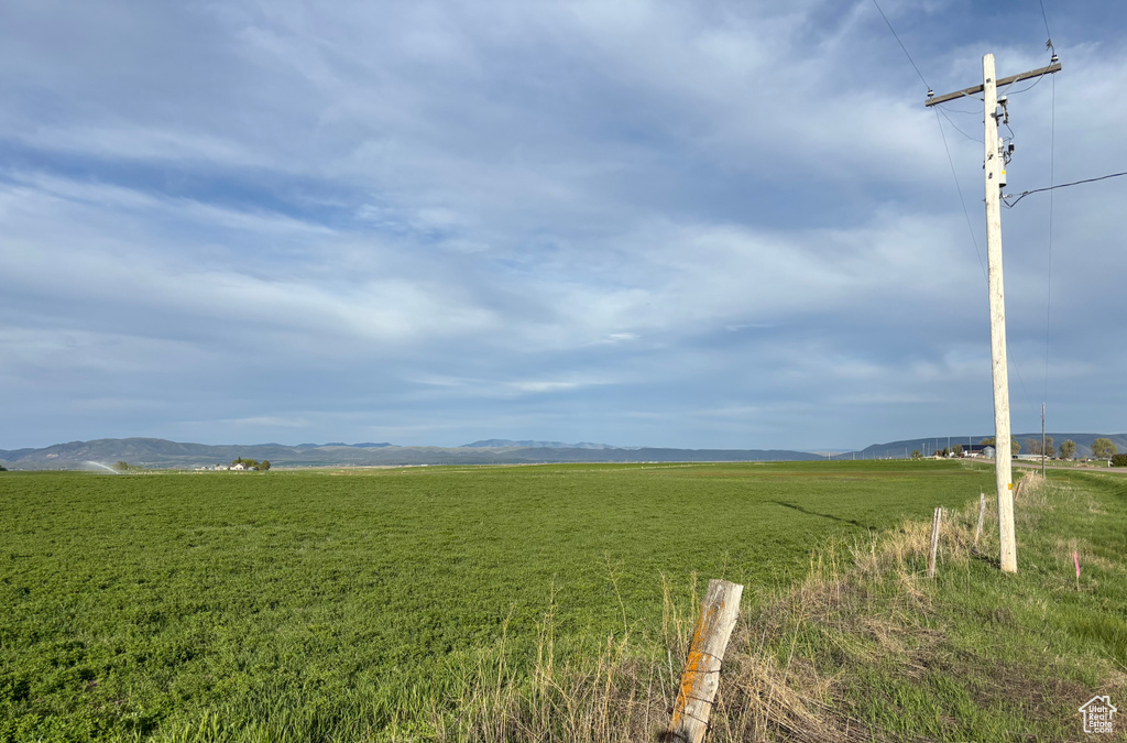View of yard featuring a mountain view and a rural view