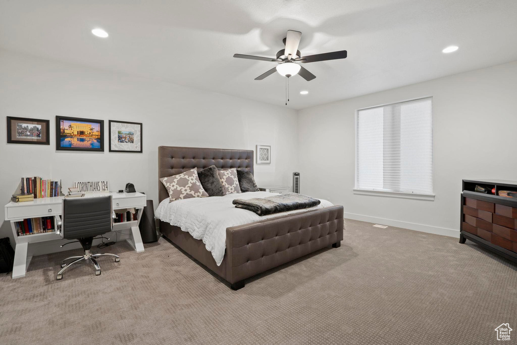 Bedroom with light carpet and ceiling fan