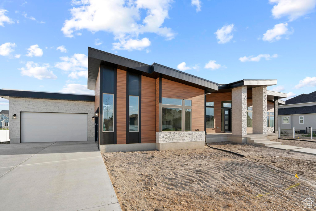 Modern home featuring a garage