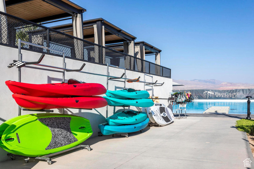 Exterior space featuring a water and mountain view