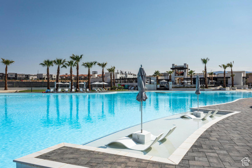 View of swimming pool with a patio area