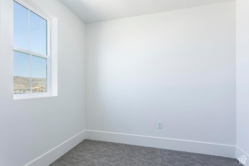 View of carpeted spare room