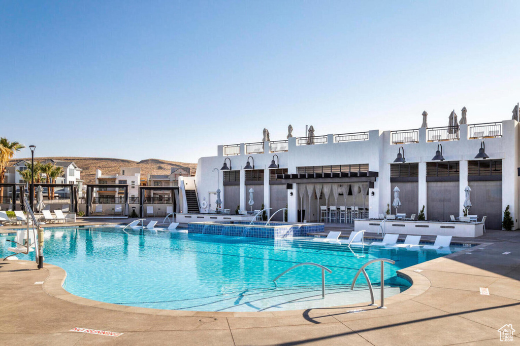 View of swimming pool with a patio
