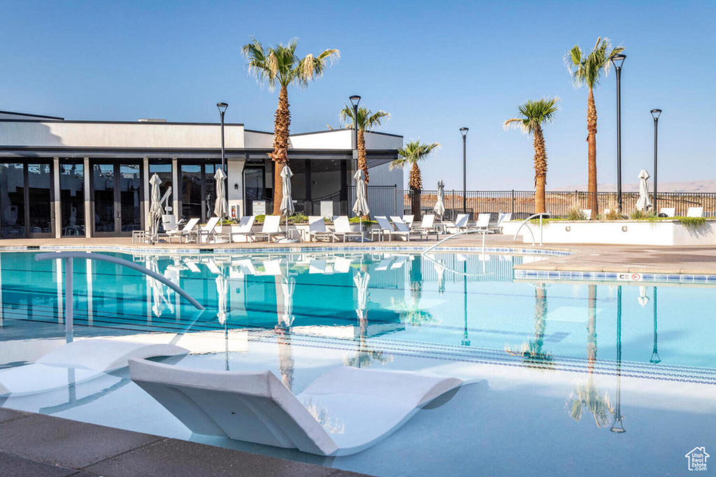 View of swimming pool with a patio area