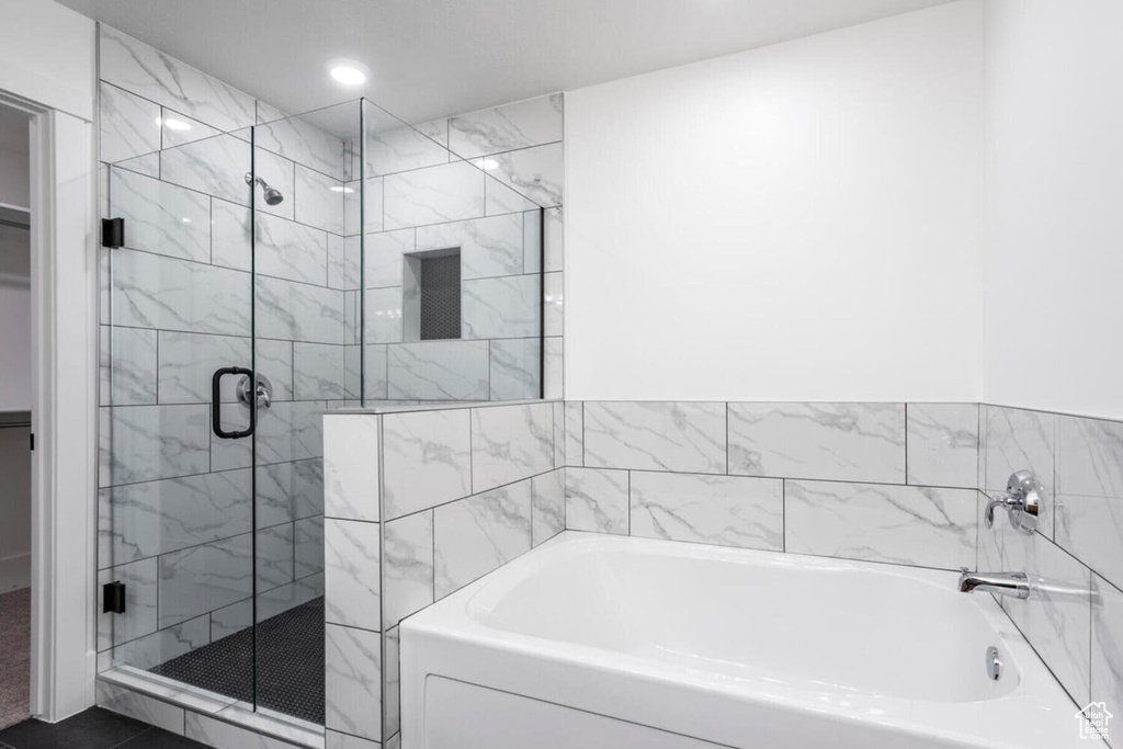 Bathroom with plus walk in shower