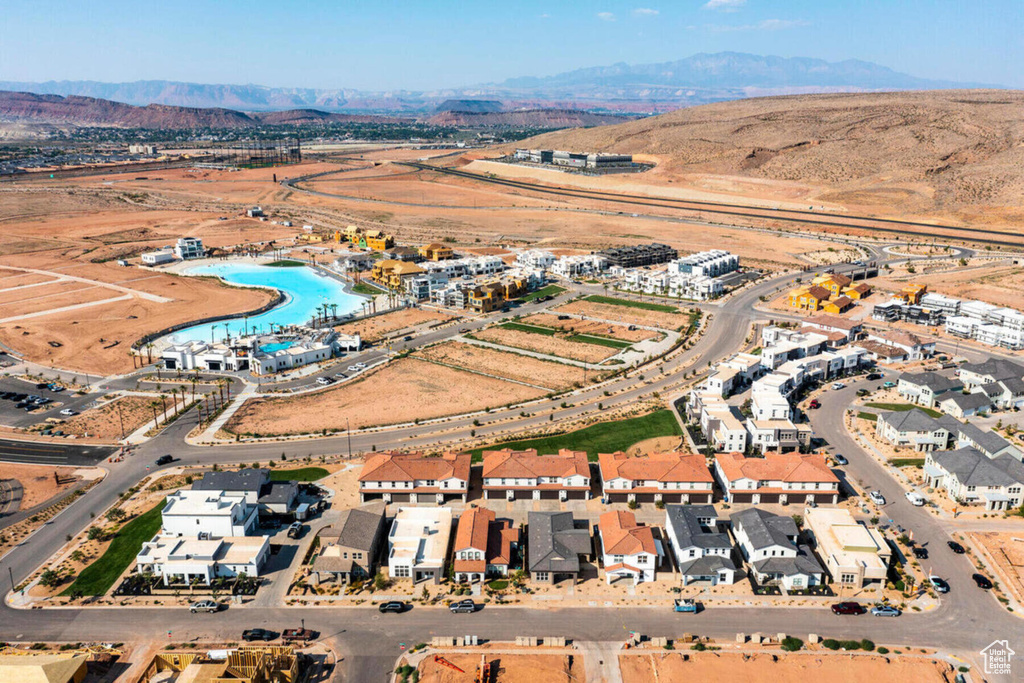 Birds eye view of property with a mountain view