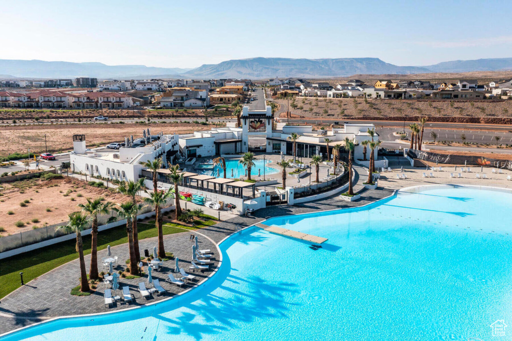 View of pool with a mountain view
