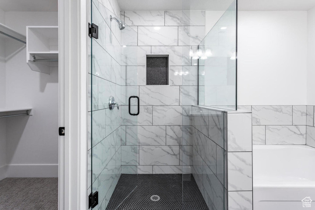Bathroom featuring an enclosed shower