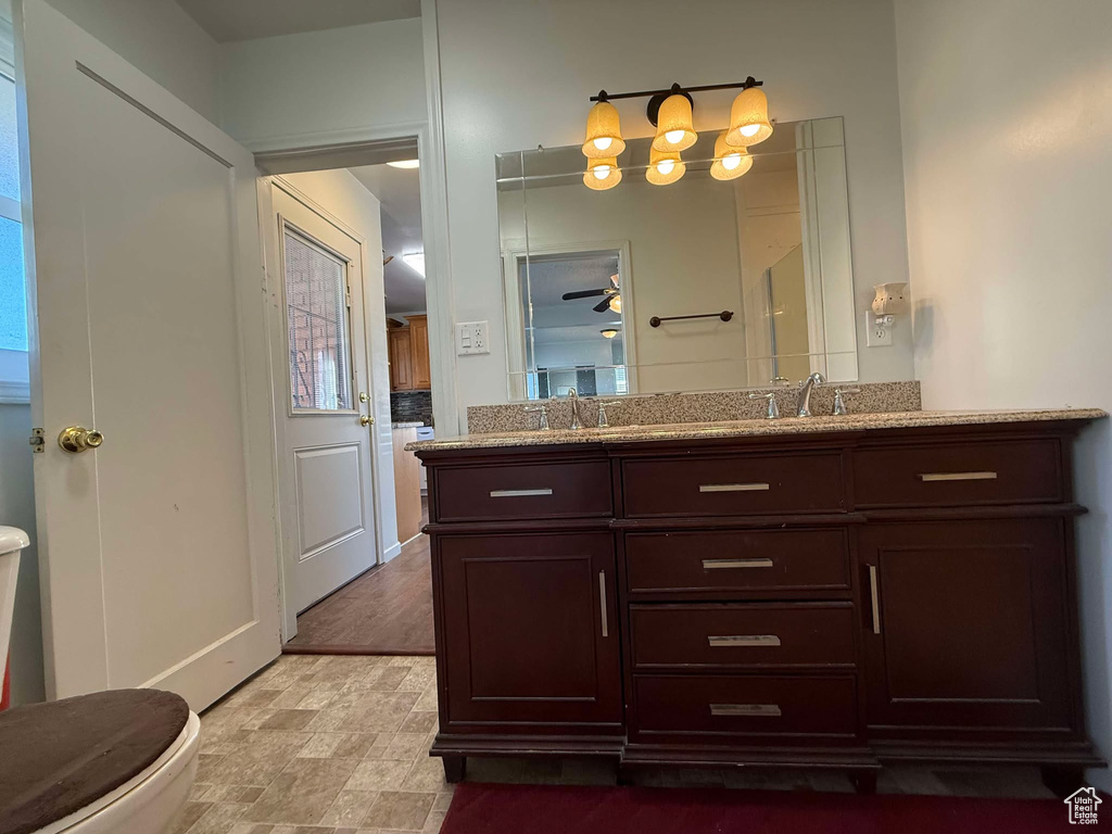 Bathroom with vanity and toilet