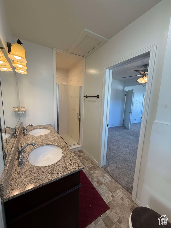 Bathroom featuring vanity and walk in shower