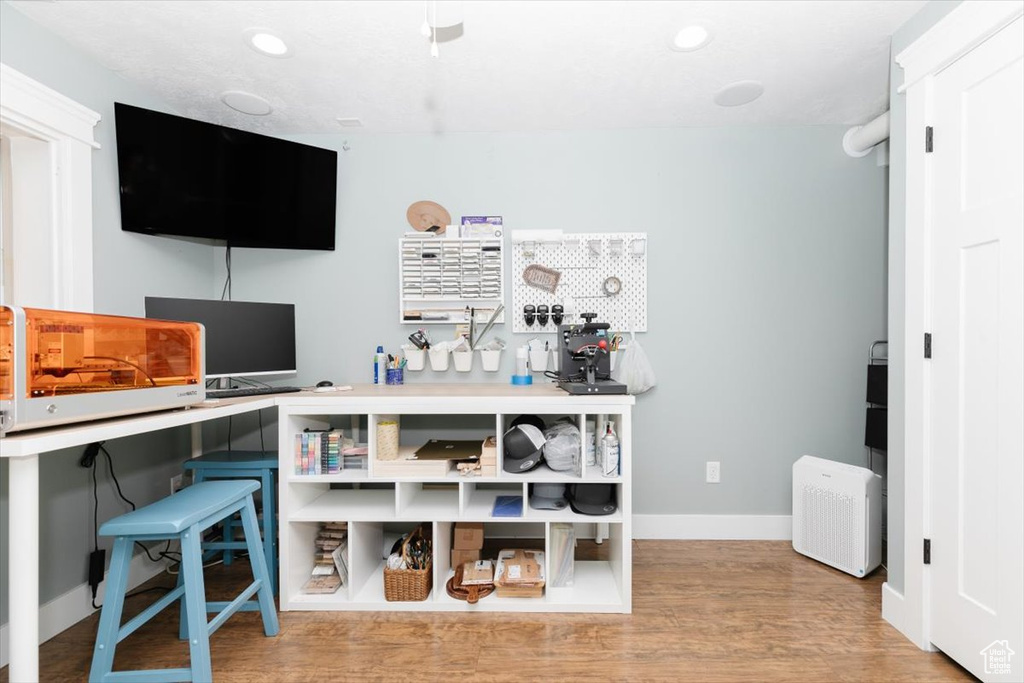 Office featuring light hardwood / wood-style floors