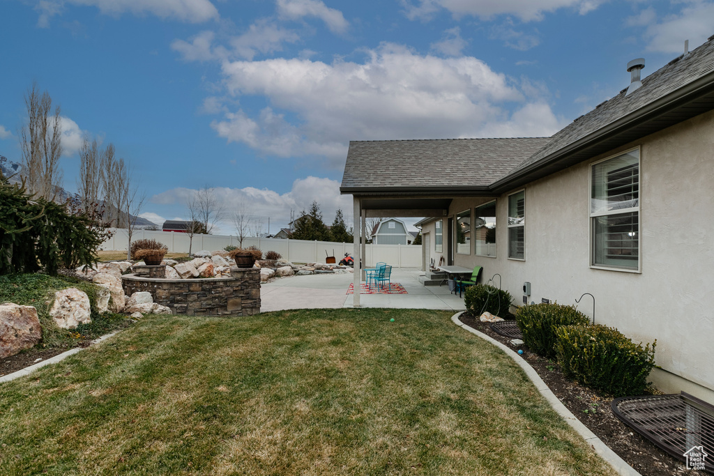 View of yard with a patio