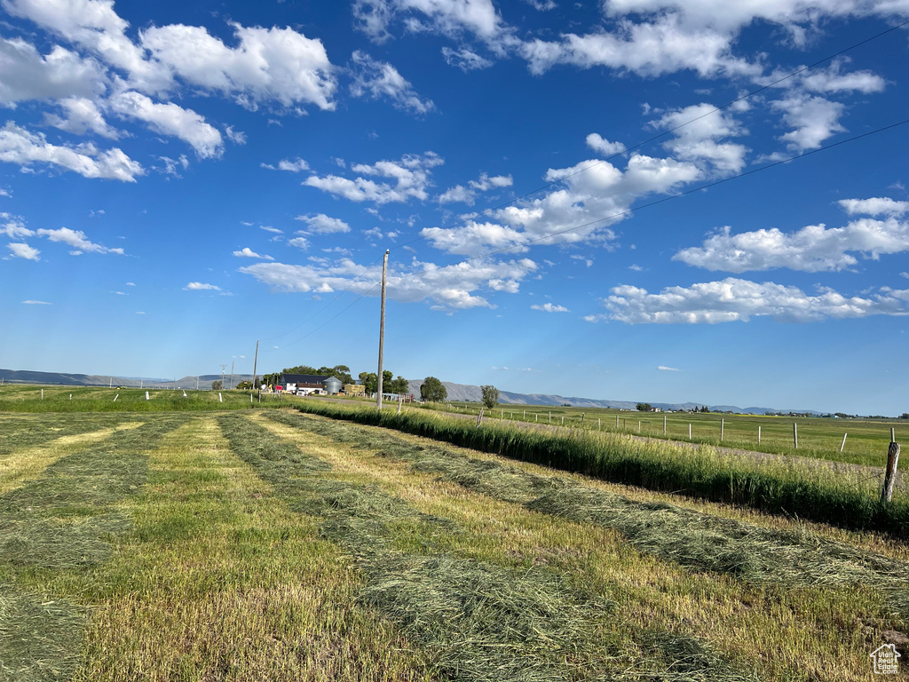 View of yard with a rural view