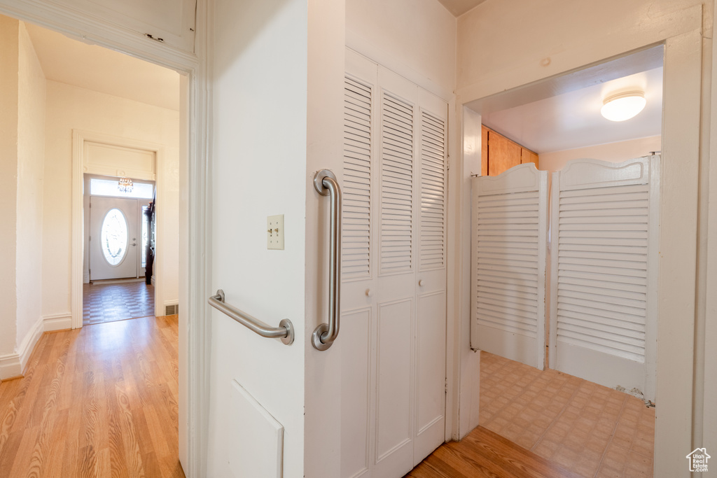 Corridor featuring light hardwood / wood-style floors