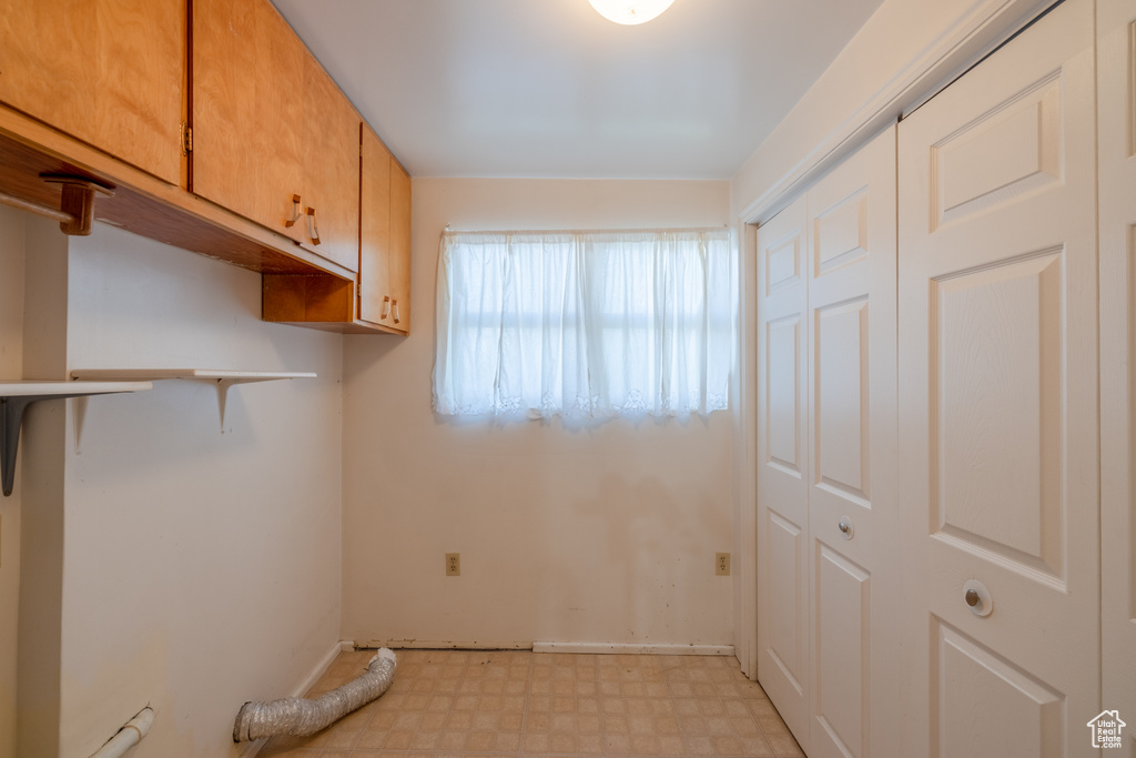 Washroom featuring cabinets