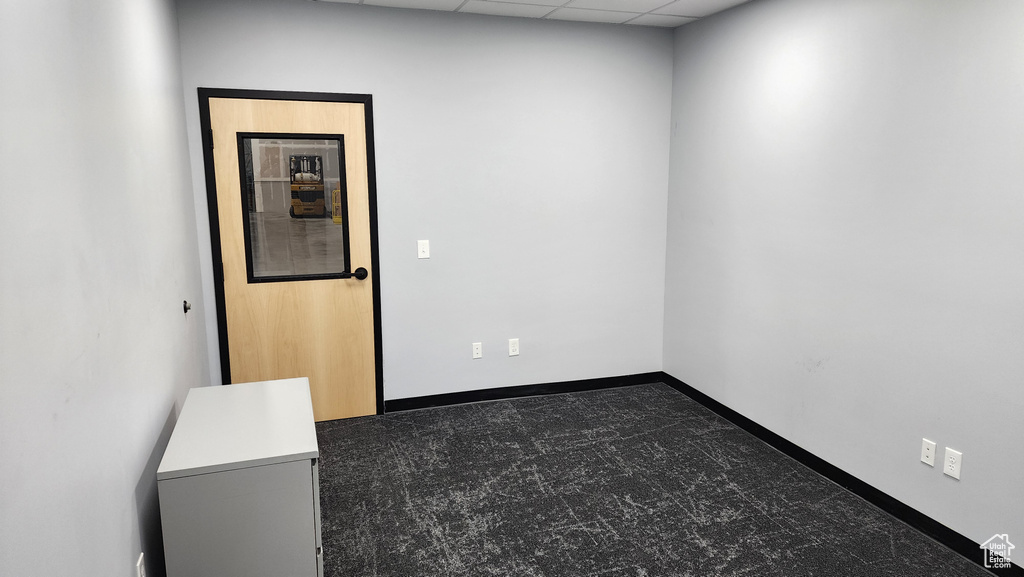 Unfurnished room featuring a paneled ceiling