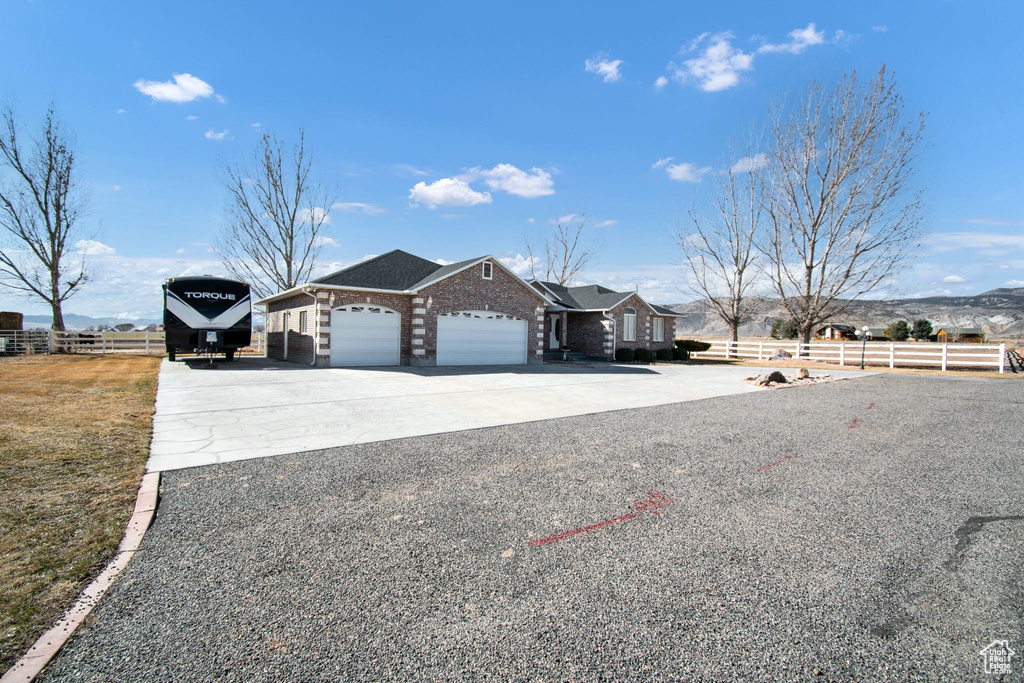 View of front of property with a garage