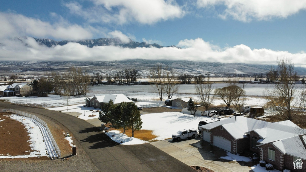 Snowy aerial view with a mountain view