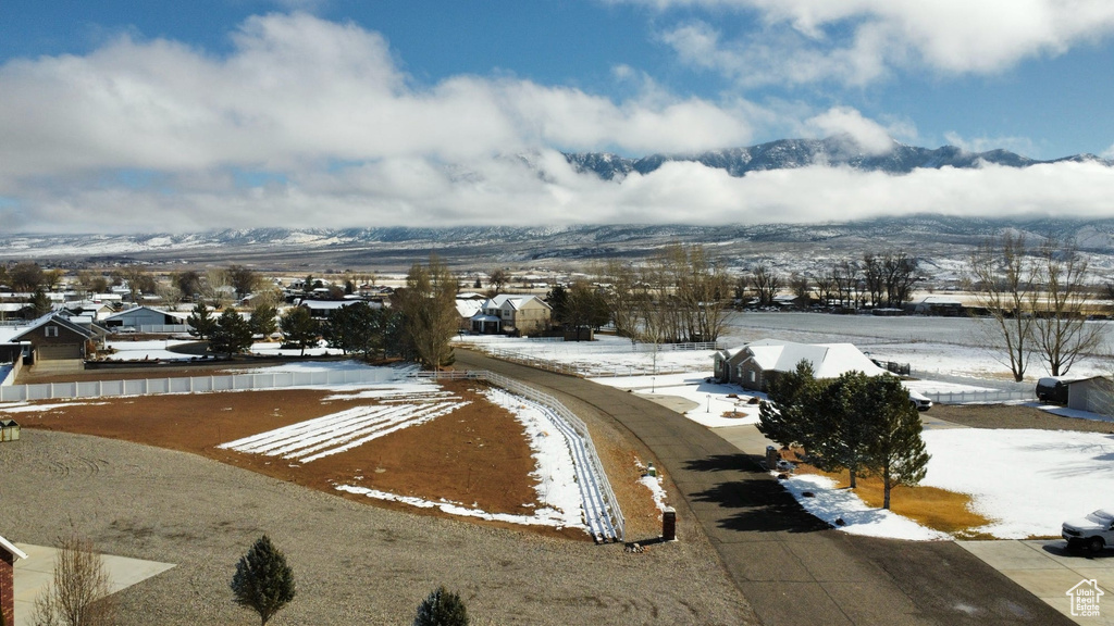 Snowy aerial view with a mountain view