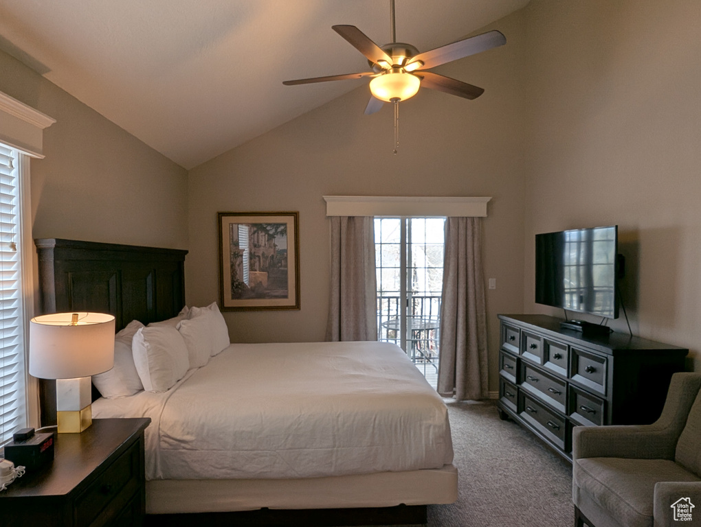 Bedroom with vaulted ceiling, carpet, access to exterior, and ceiling fan