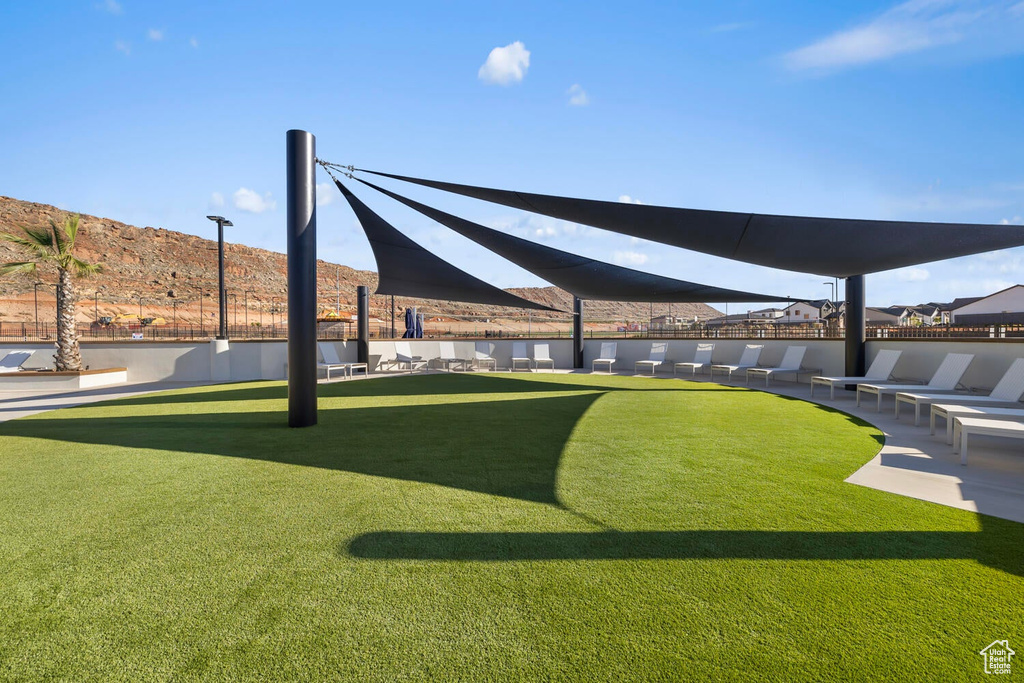View of property\\\'s community with a lawn