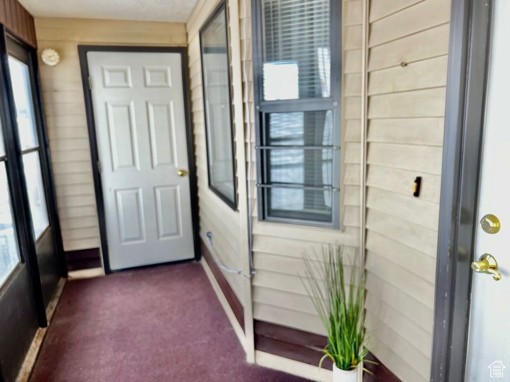 Entrance to property with covered porch