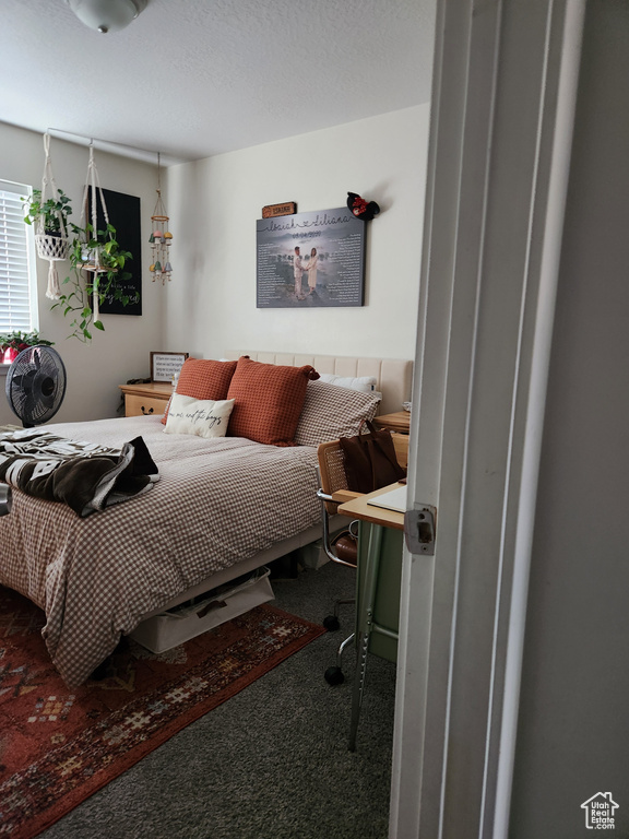 Bedroom featuring carpet flooring