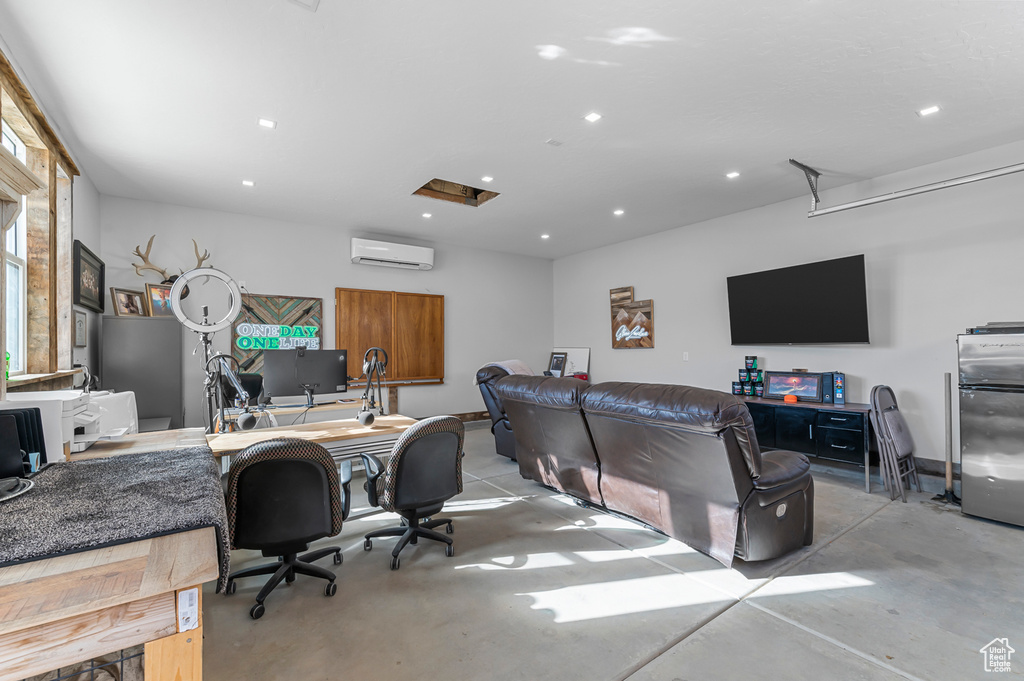 Home office featuring an AC wall unit