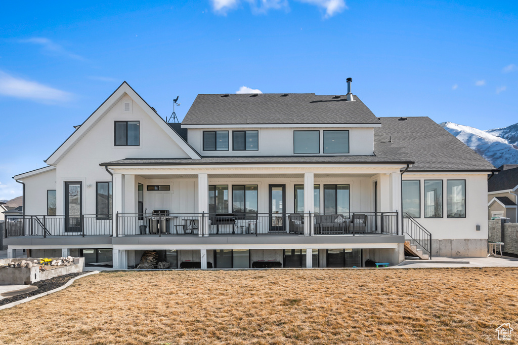 Back of house with a mountain view