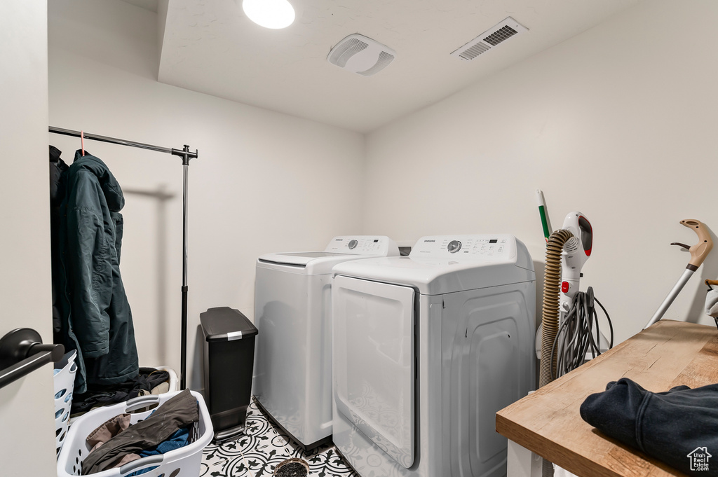 Laundry area with separate washer and dryer