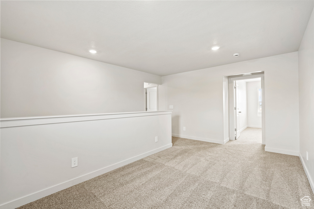 Spare room with baseboards, carpet flooring, and recessed lighting