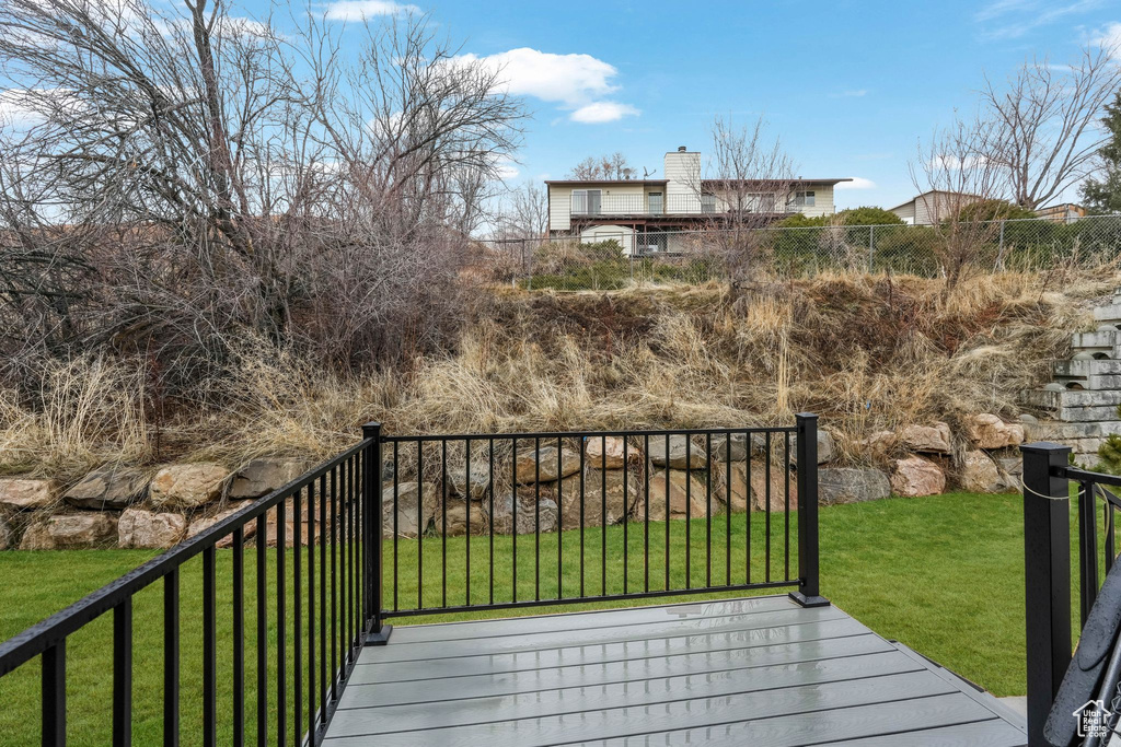 Wooden deck with a yard