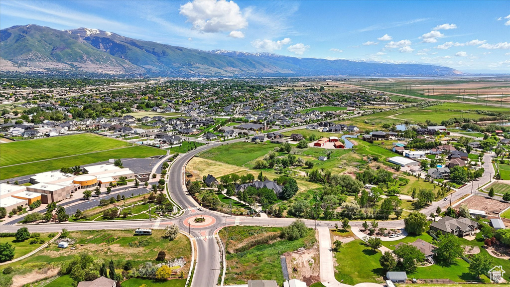 Aerial view of residential area with a mountainous background