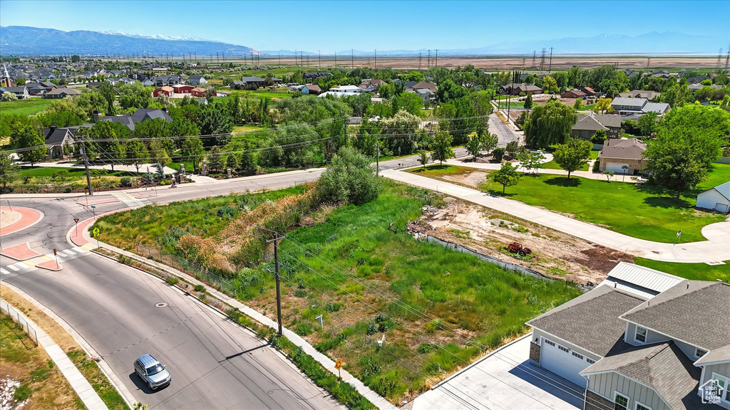 Aerial view of residential area featuring mountains
