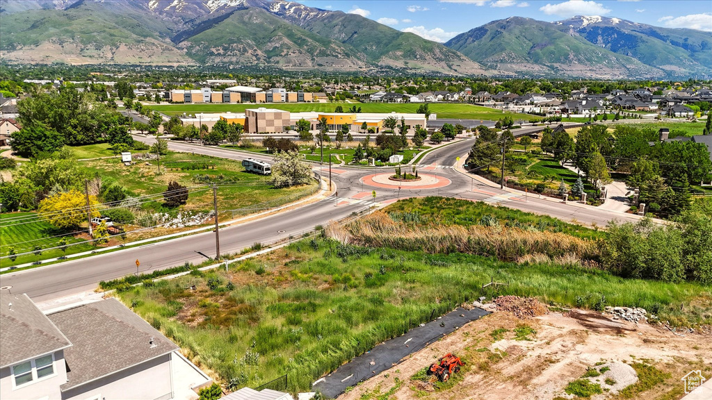 View of mountain backdrop with nearby suburban area