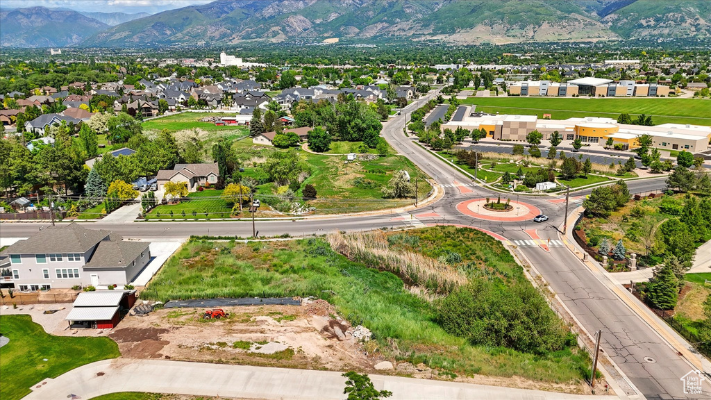 Aerial view of residential area featuring mountains
