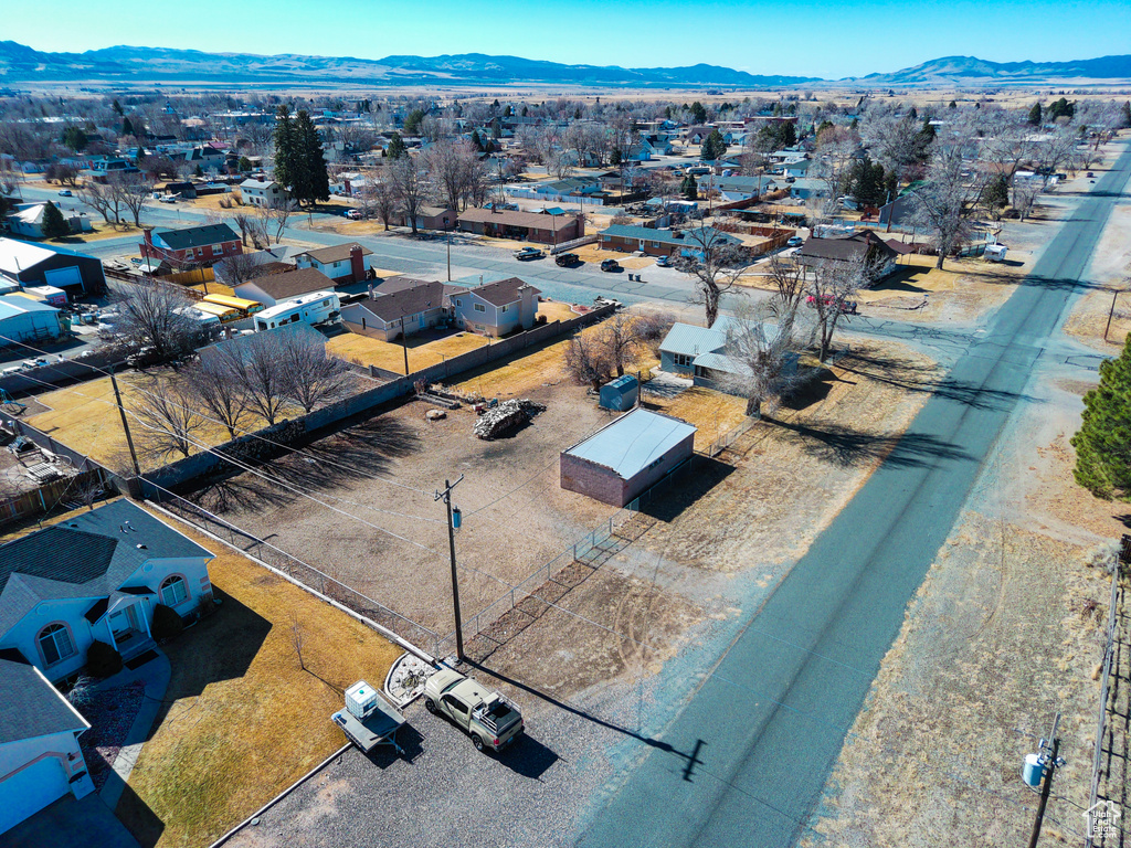 Birds eye view of property with a mountain view