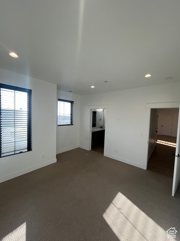 Interior space featuring dark carpet