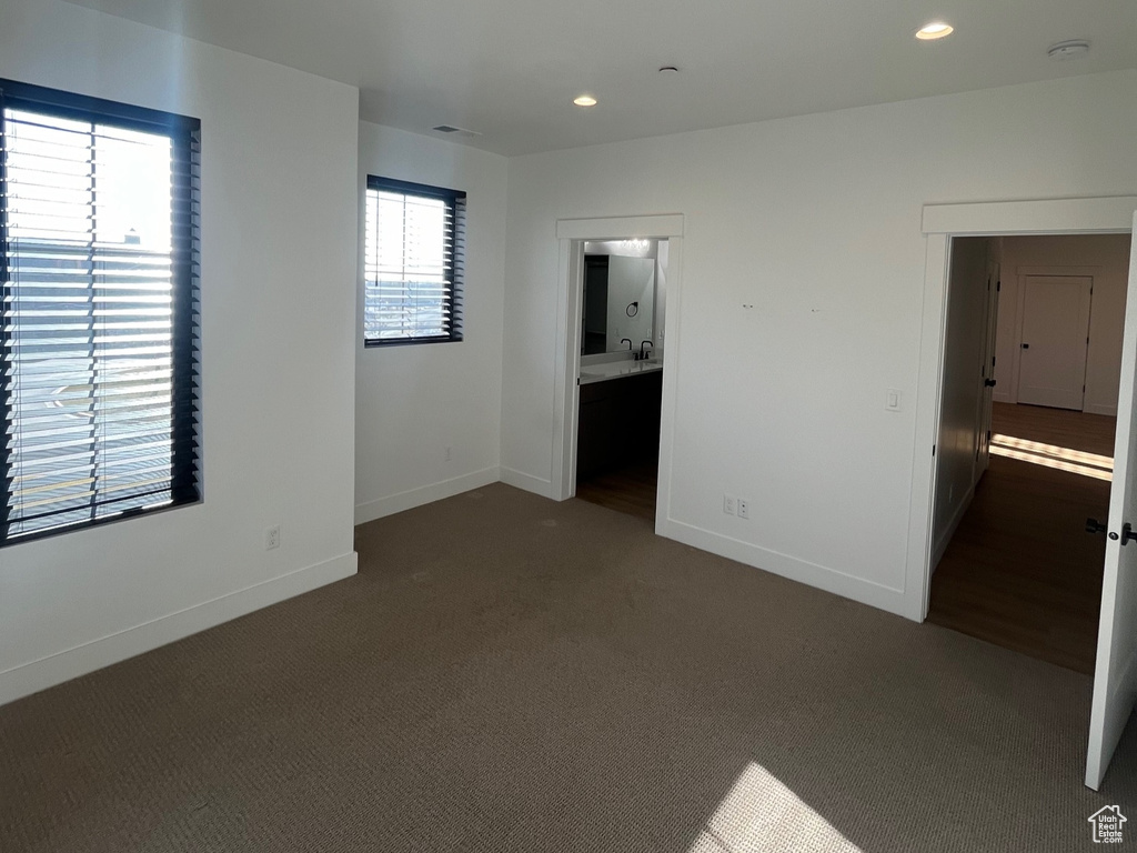 Interior space with dark colored carpet